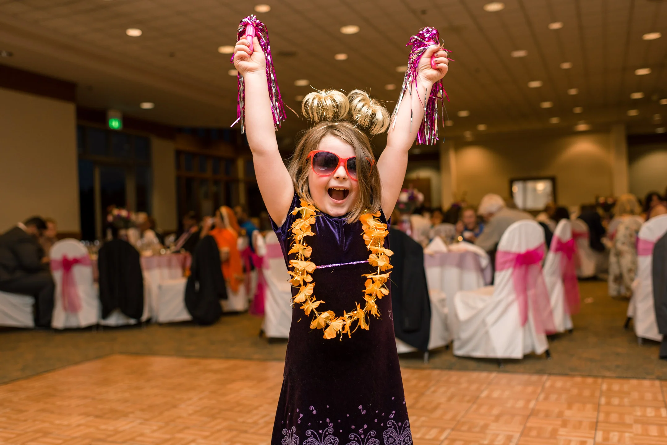 Wedding Guests Dance and Have Fun during Reception