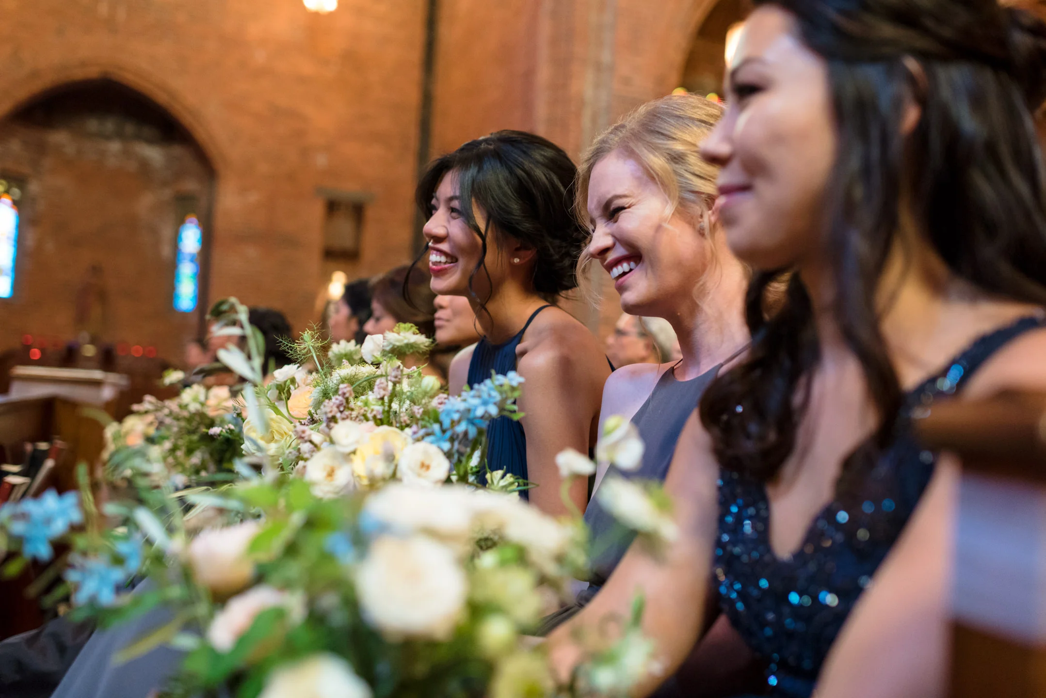 Bridesmaids Happy Laugh during Wedding Ceremony