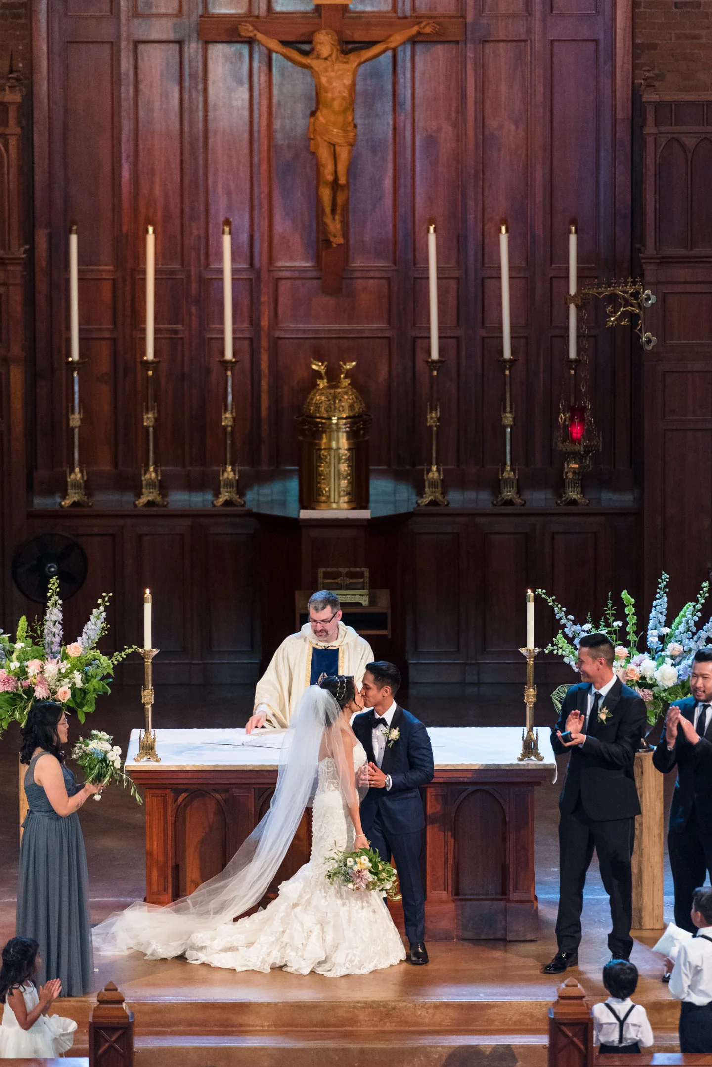 Asian Bride and Groom Kiss during Wedding Ceremony