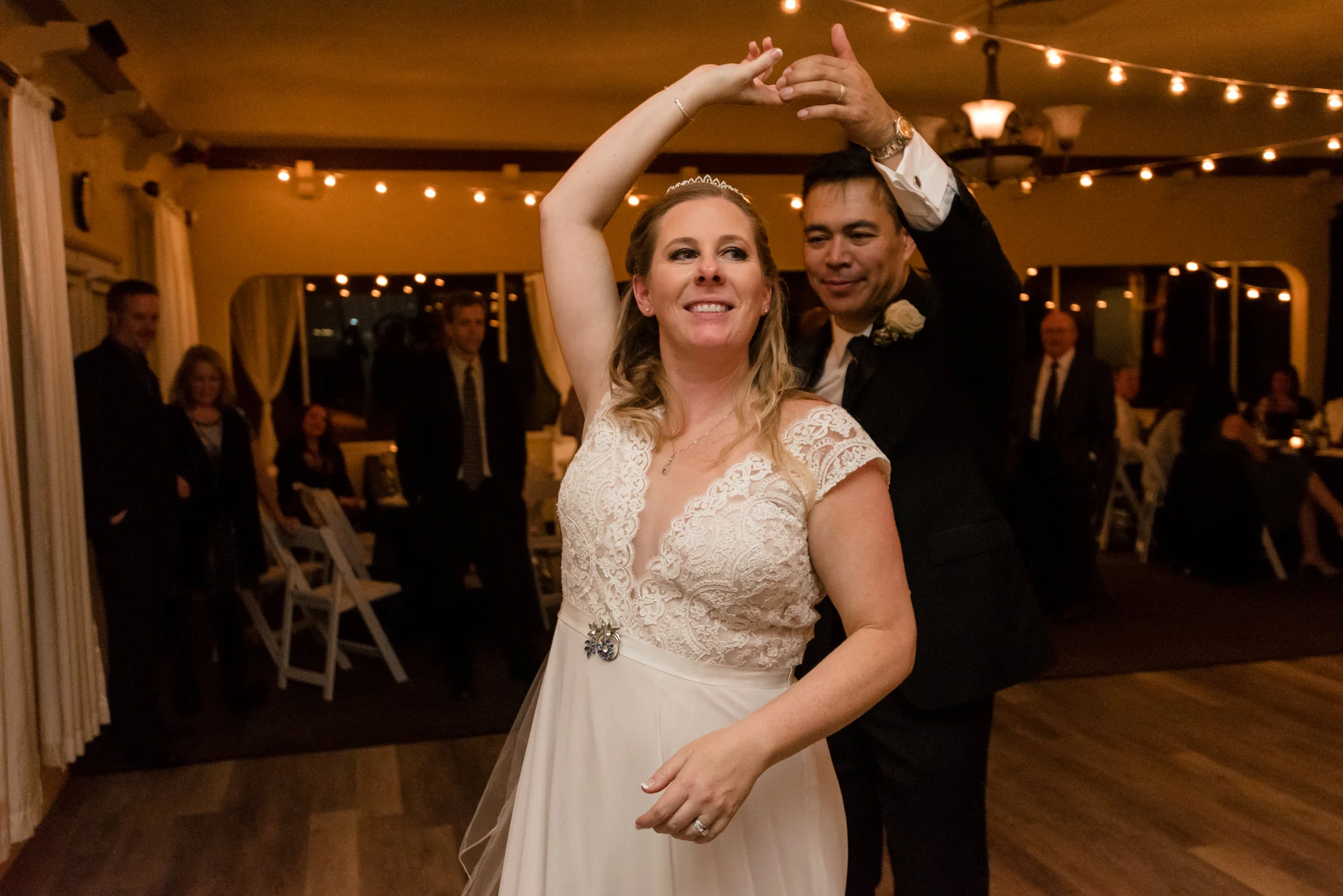 Bride and Asian Groom Dance during Wedding Reception
