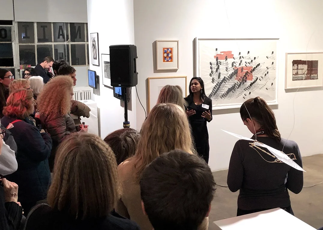 Shivangi giving an artist talk in front of her work as part of Edging Forward: New Prints 2018/Winter .