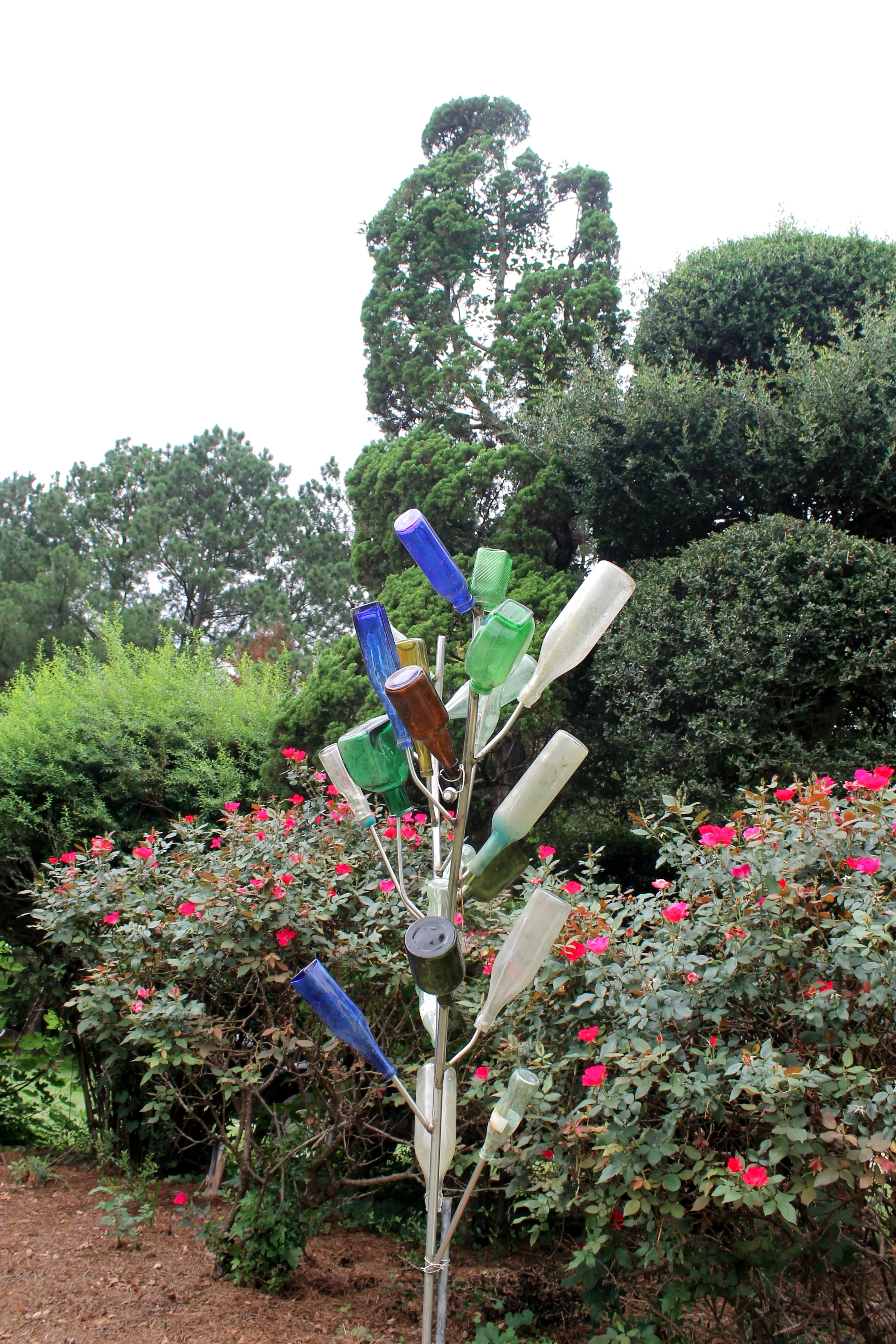 A glass bottle tree at Pearl Fryar’s Topiary Garden.