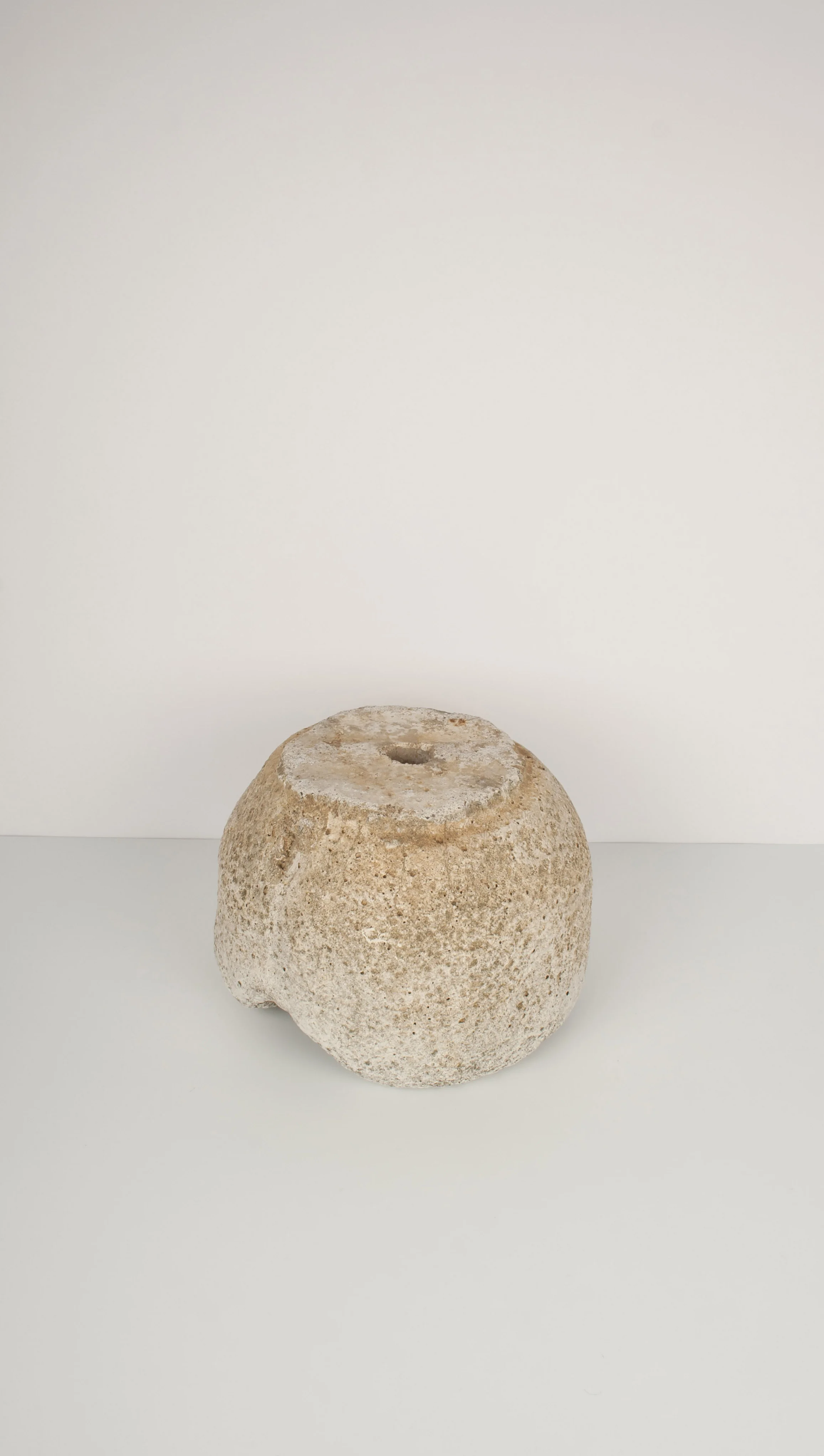 Round stone planter