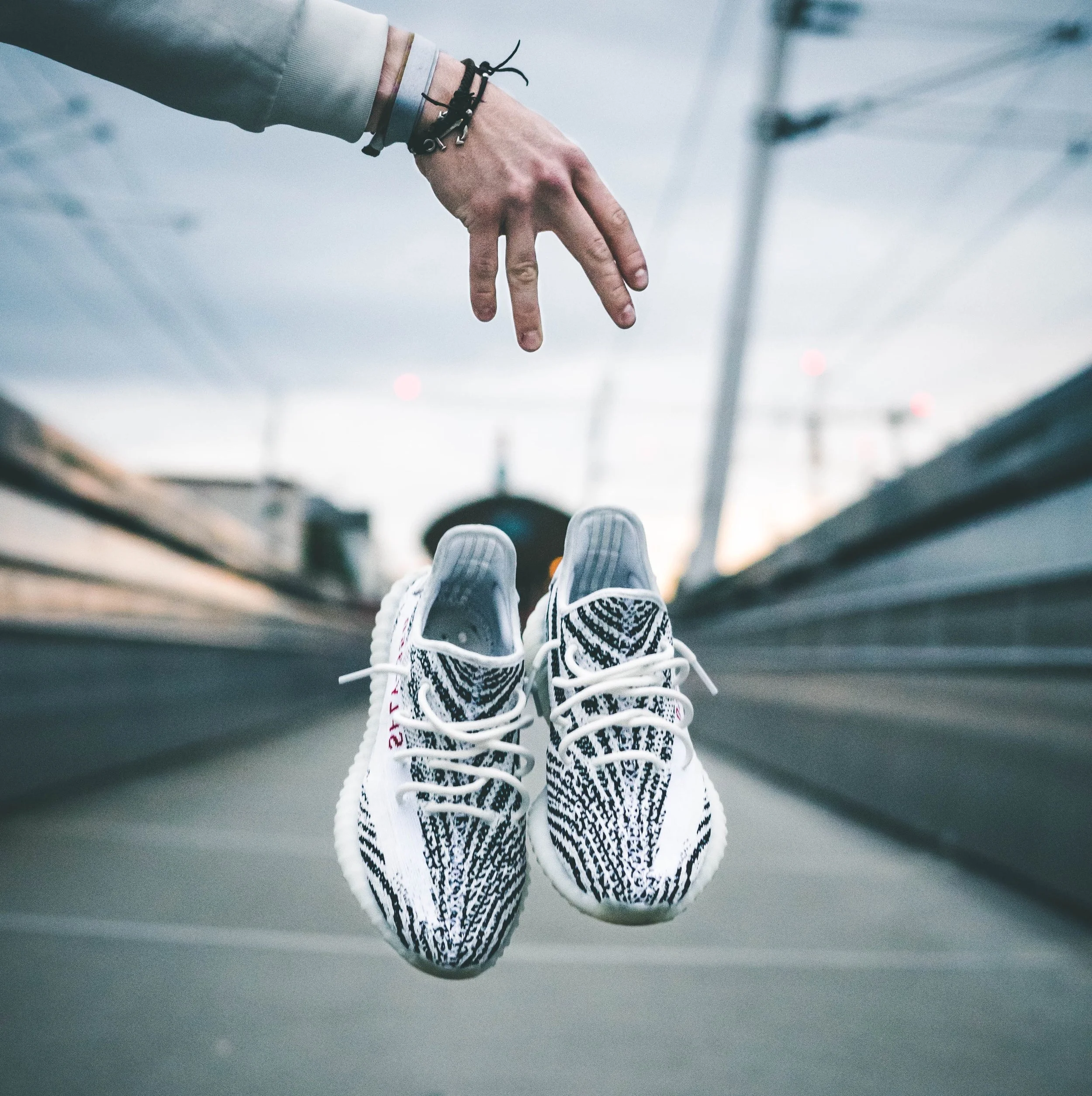A 2016 report from Organization for Economic Cooperation and Development lists footwear as the #1 counterfeited product and Yeezys is one of the most popular shoe line being counterfeited. // Image: Greg T / Unsplash
