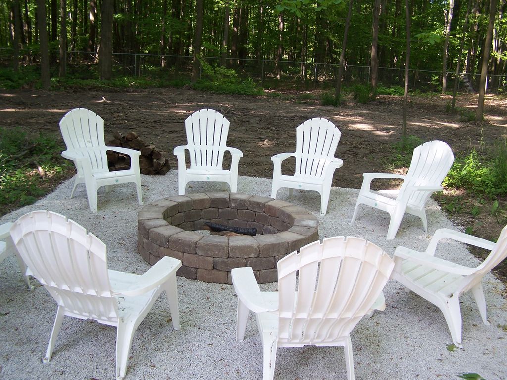 Backyard has firepit