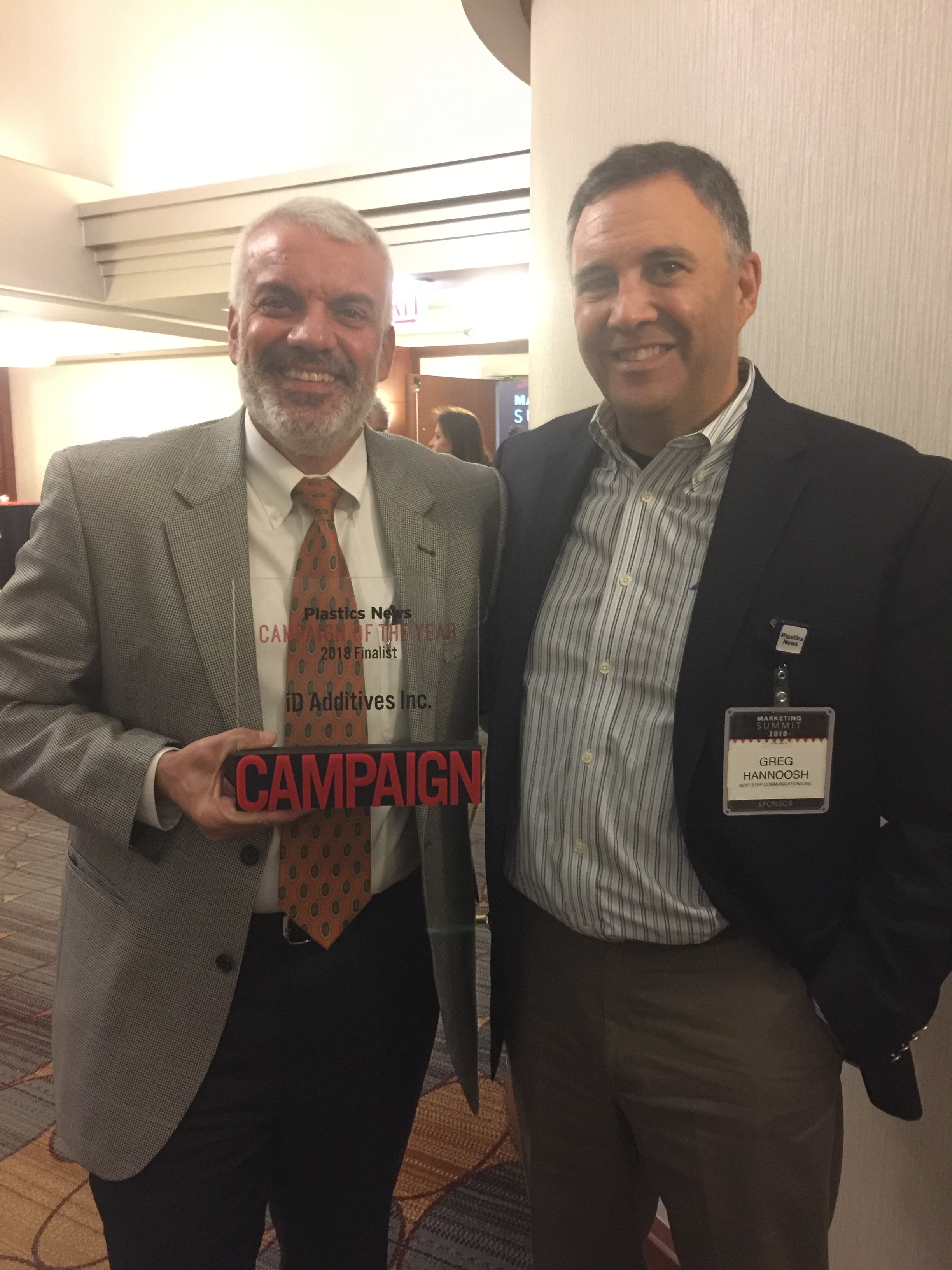 Nick Sotos (l), President of iD Additives, and Next Step President Greg Hannoosh at the 2018 Plastics News Marketing Summit