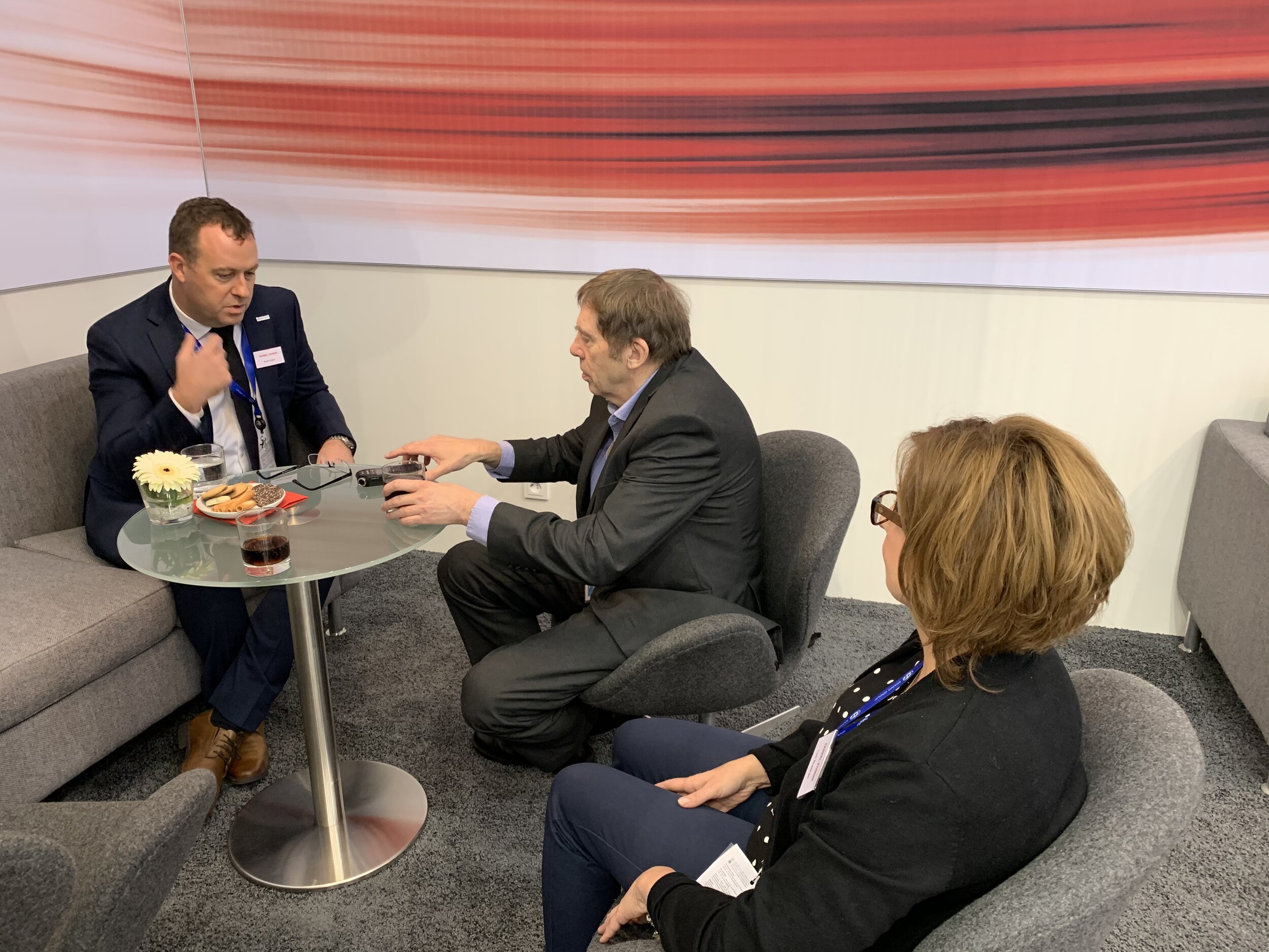   October 18: Farrel Pomini's Paul Lloyd (left) and Lori Sheehan (right) meet with Printz Holman of Plastics in Packaging magazine  