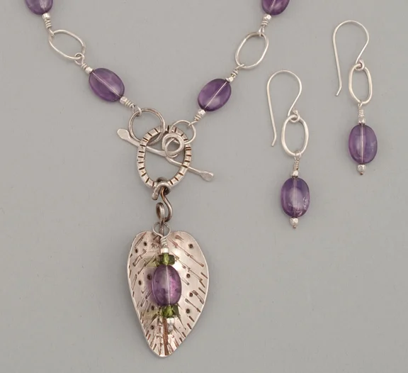 Amethyst, forged silver chain and leaf, peridot