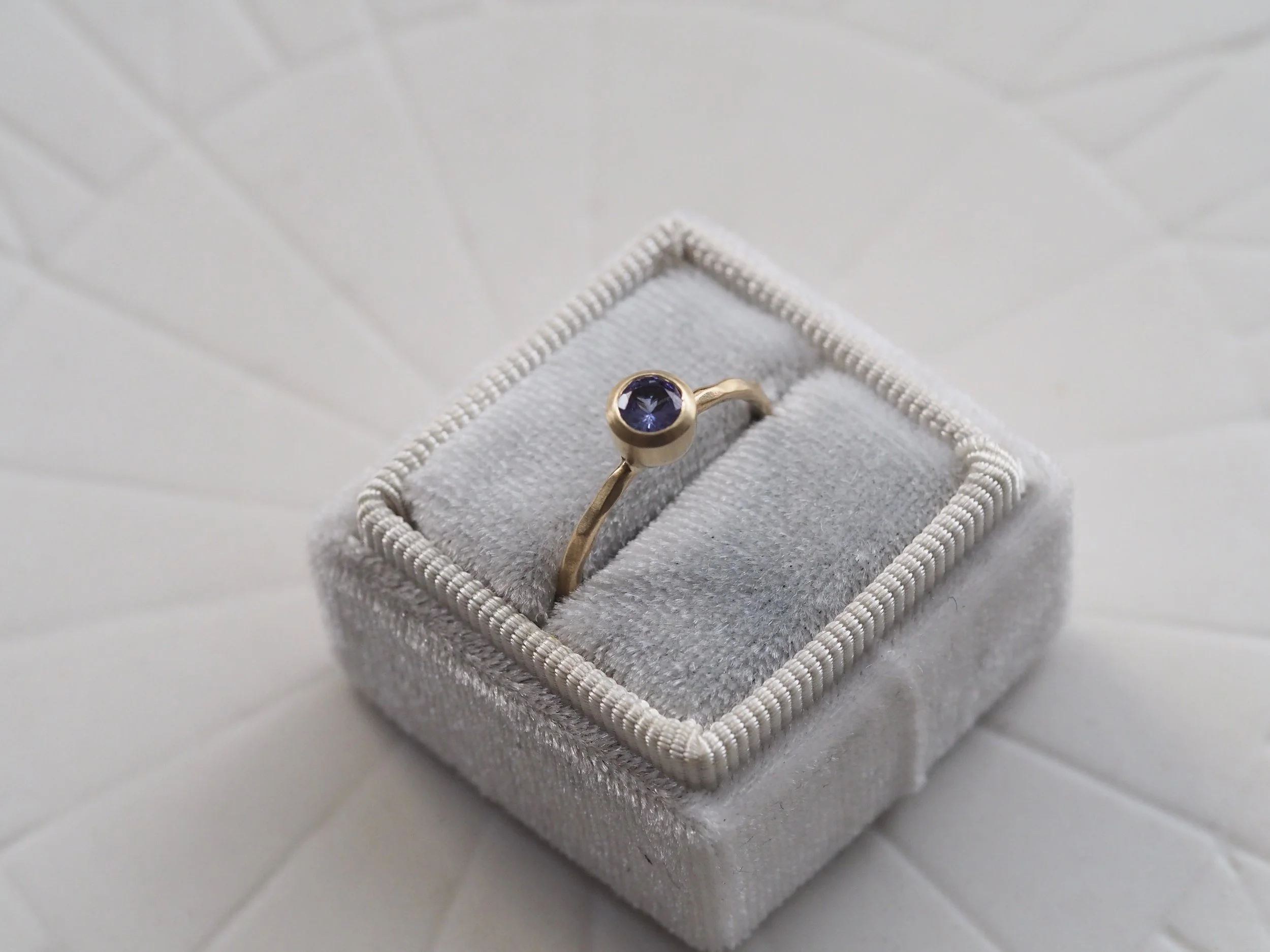 tanzanite slim gold ring.jpg