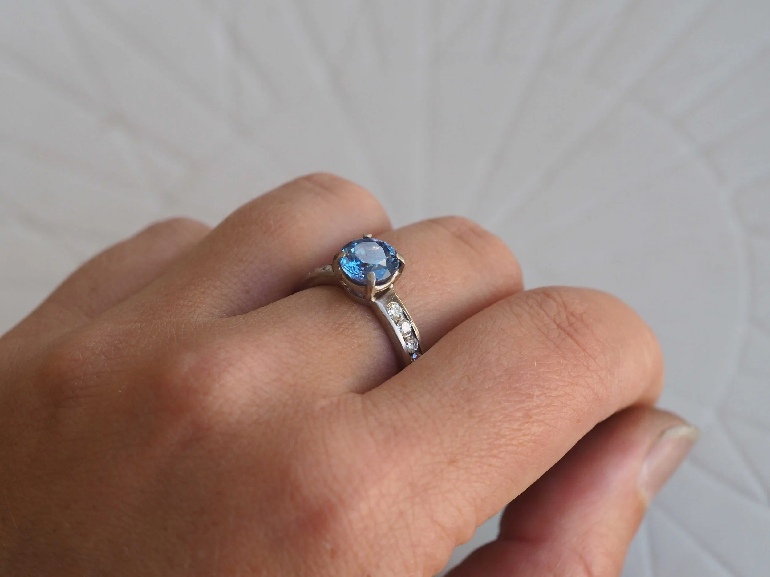Modelled-Side-3-18ct-White-Gold-Diamond-and-Sapphire-Ring.jpg