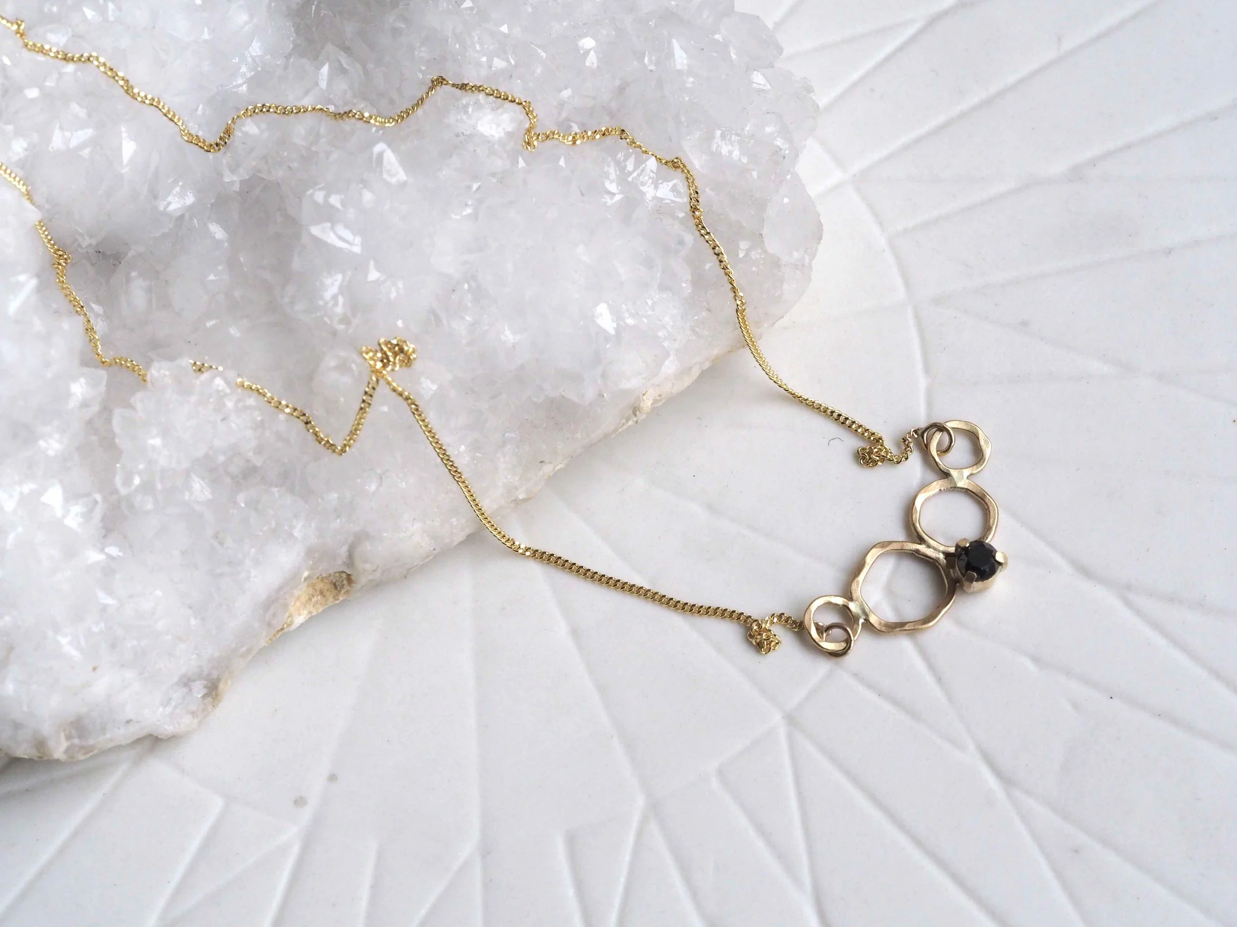 Black-Diamond-and-Gold-Necklace.jpg
