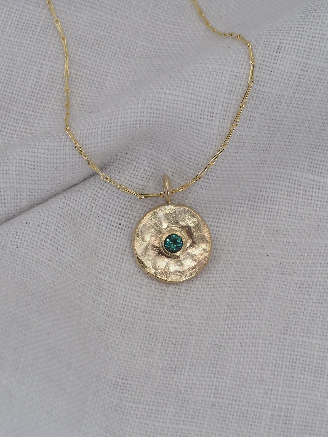 tourm disc pendant.jpg