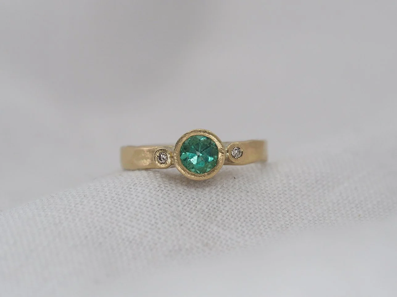 emerald tril ring.jpg