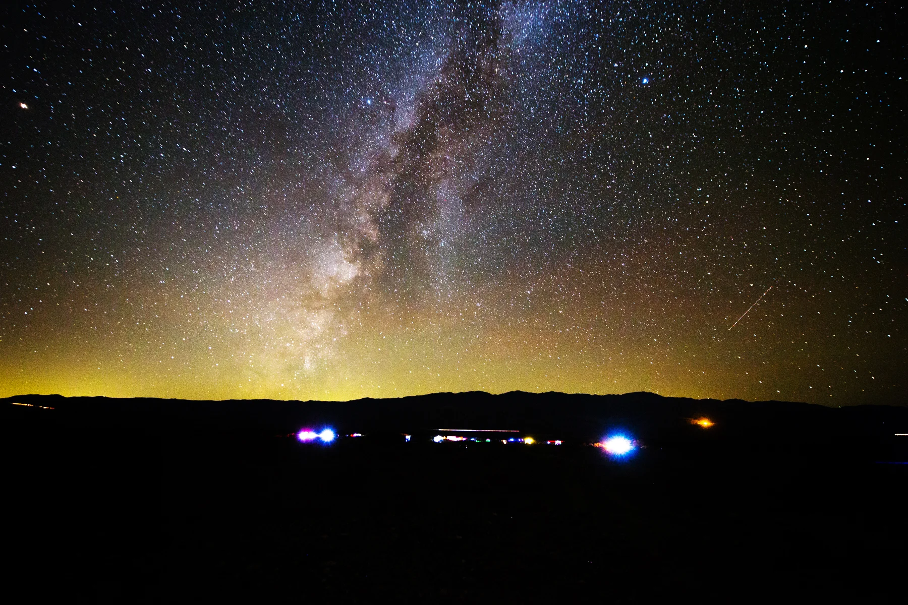 The sky is alive over a star party at the Death Valley Stargazing Camp