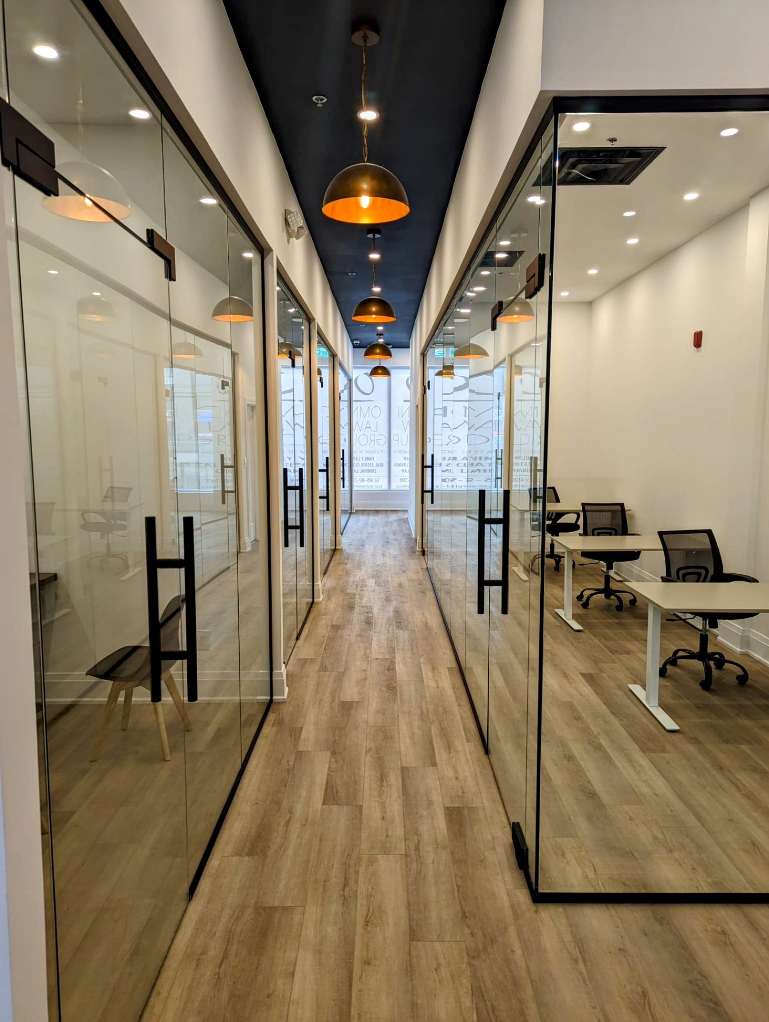 Refined and professional hallway at OMNI LAW GROUP office.