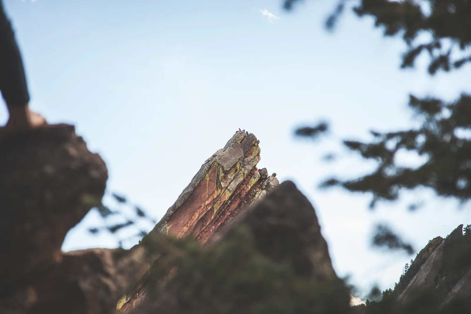 Do you see the rock climbers on top?