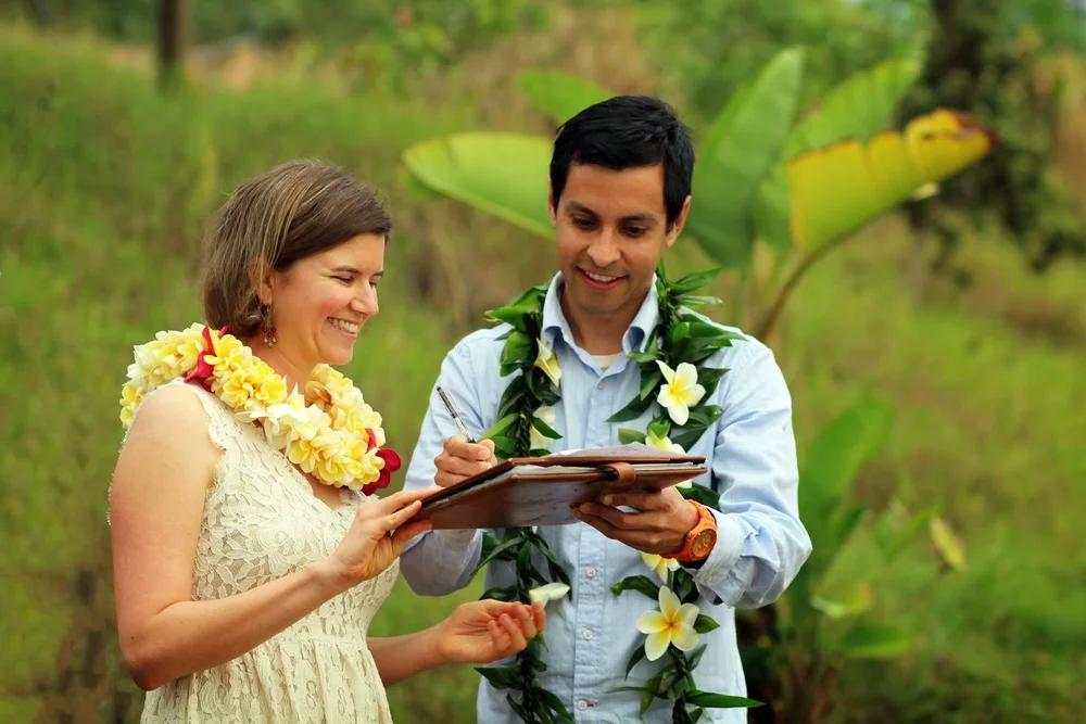 Signing their marriage certificate!