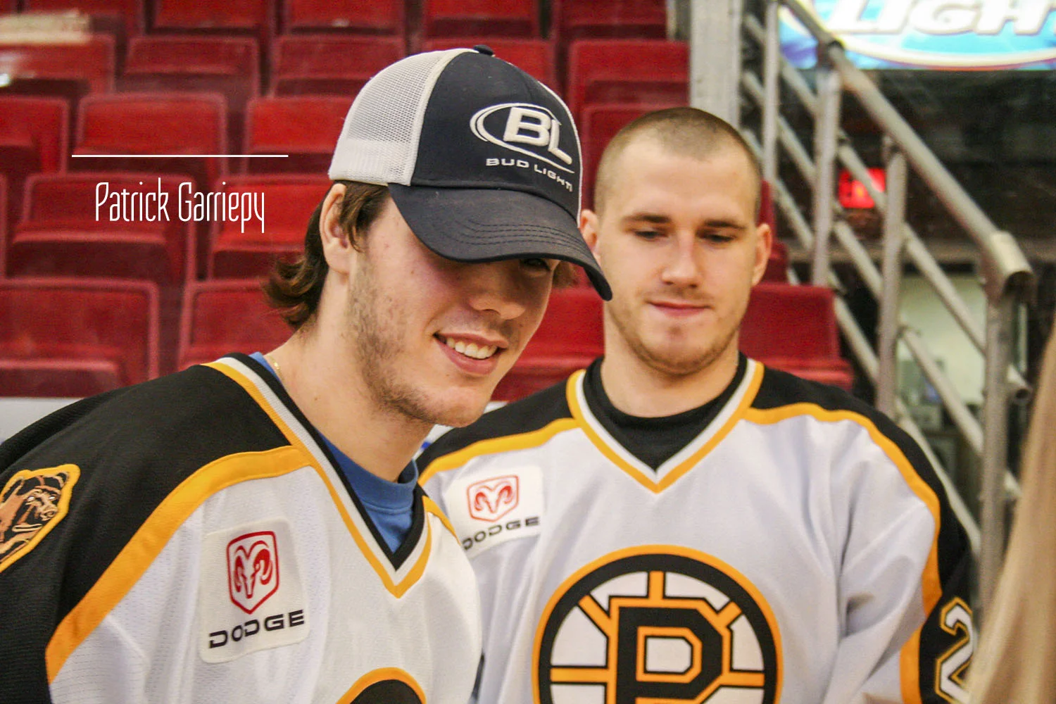 David Krejci (Bud Lite hat) and Martins Karsums in December 2006