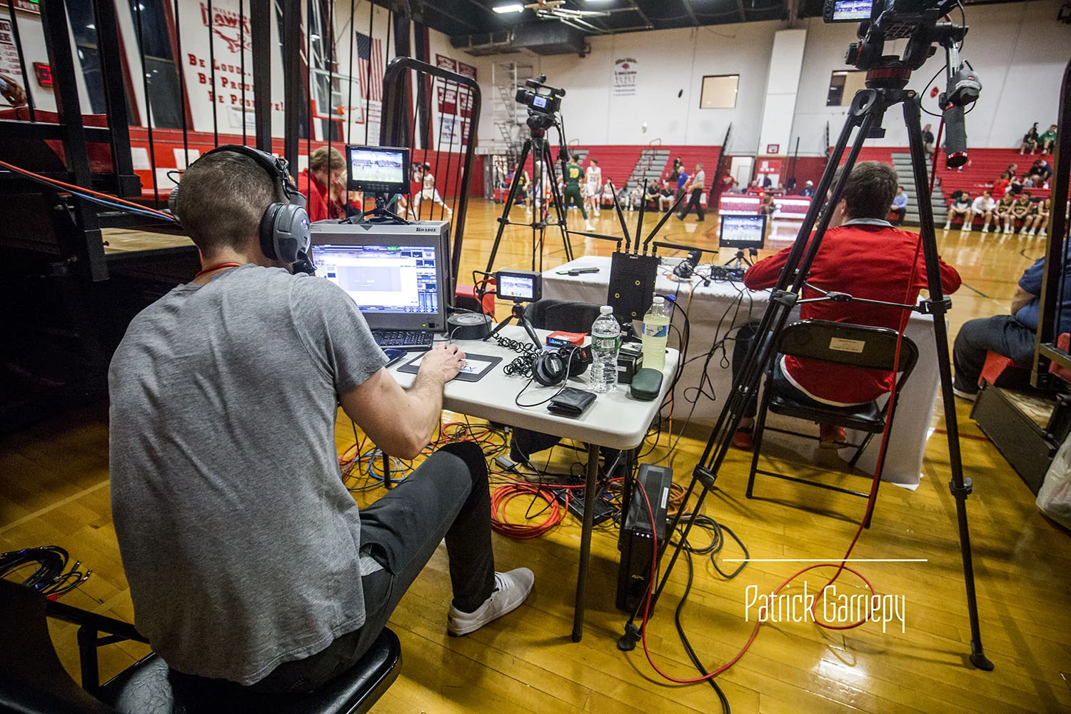 Rob and company preparing to produce a Milford High School basketball game.