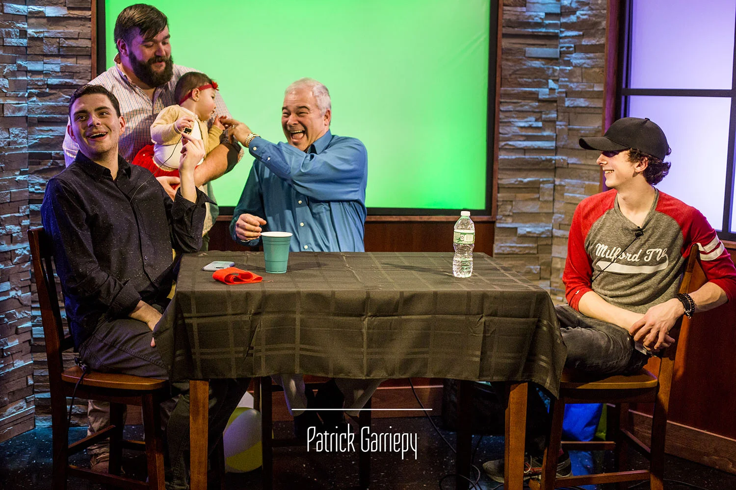 "Talk Show" Host RJ Sheedy, "That Milford Show" Host Al Correia and volunteer Malcolm Zale share an on-air interaction with Milford TV Producer Mike Spurling and his daughter.