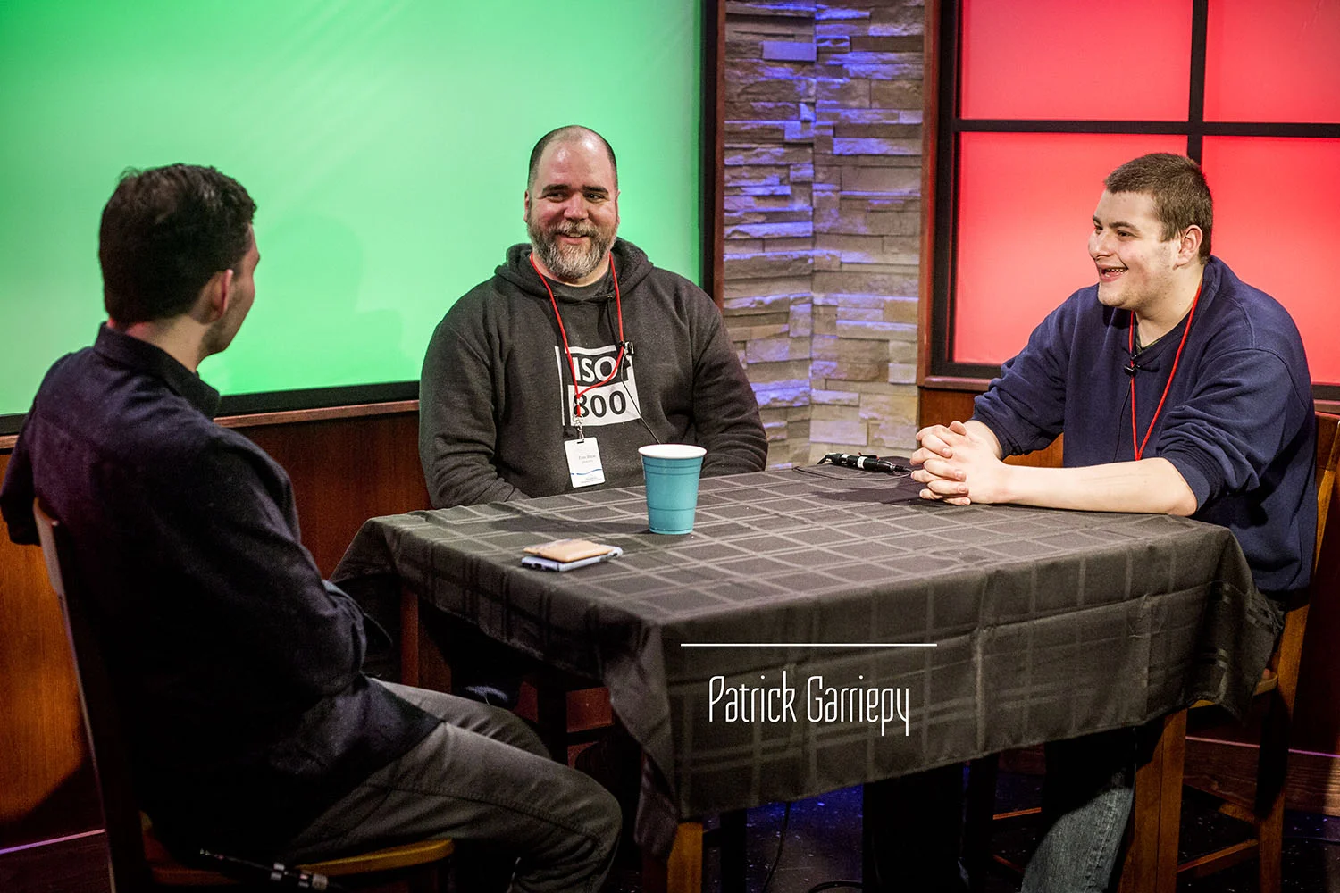 Host Sheedy (left) on air with brother Matthew (right) and Medway Photographer Tim Rice.