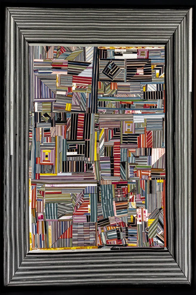 "Hands at Work Crazy Quilt (for Teresa Li)," 2017. 16 mm film, polyester thread, lithography ink, permanent marker, LEDs. 73 x 50 x 6 in.