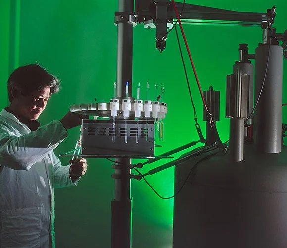 Portrait of scientist on location with green studio lighting