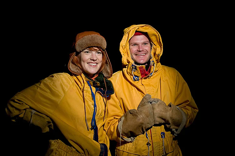 Theatre portrait of couple in black studio