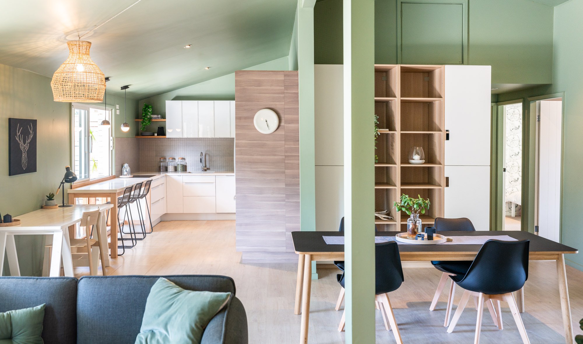 scandinavian open plan living inspiration with a green colour palette and rattan pendant on the central coast nsw.jpg