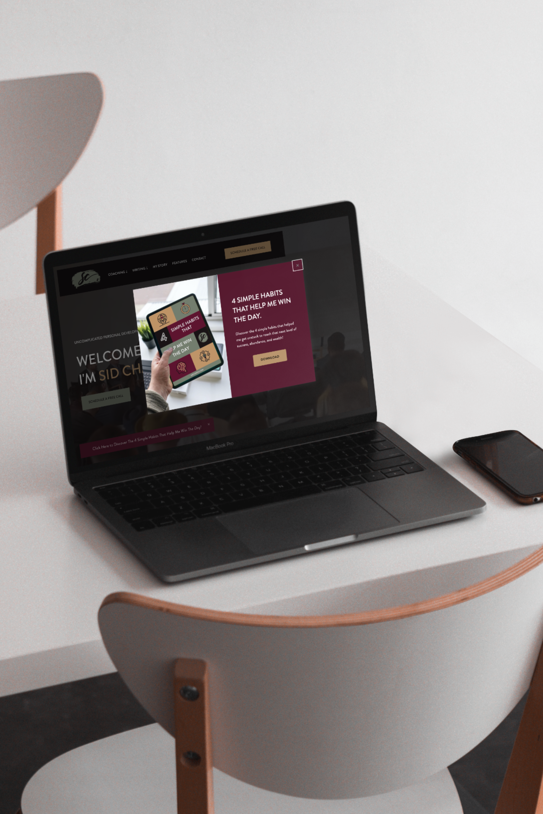 macbook-pro-on-table-mockup-template@2x.png