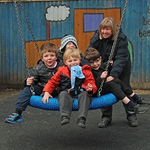 My grandson and friends enjoying their new basket swing