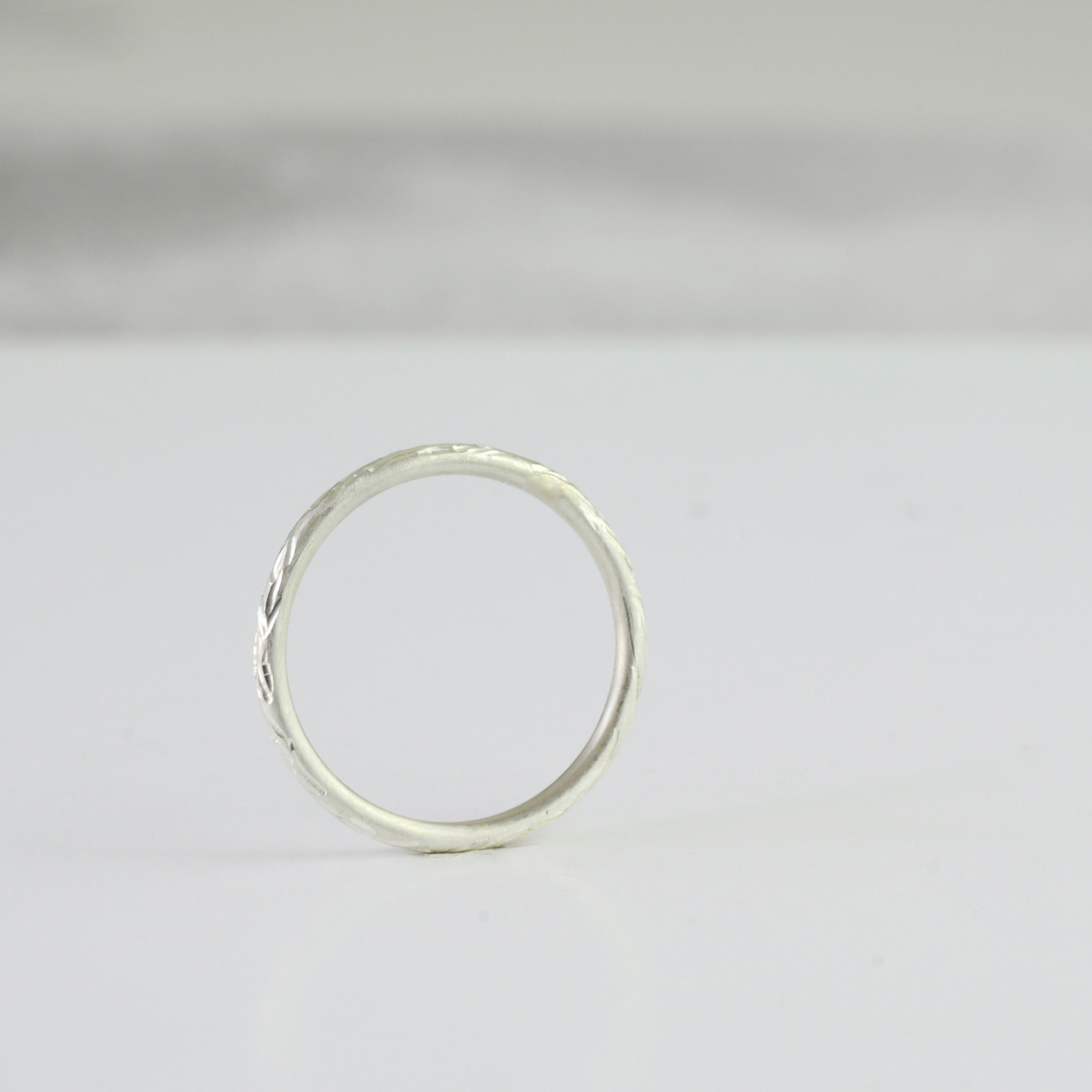 Single silver engraved stacking ring.jpg