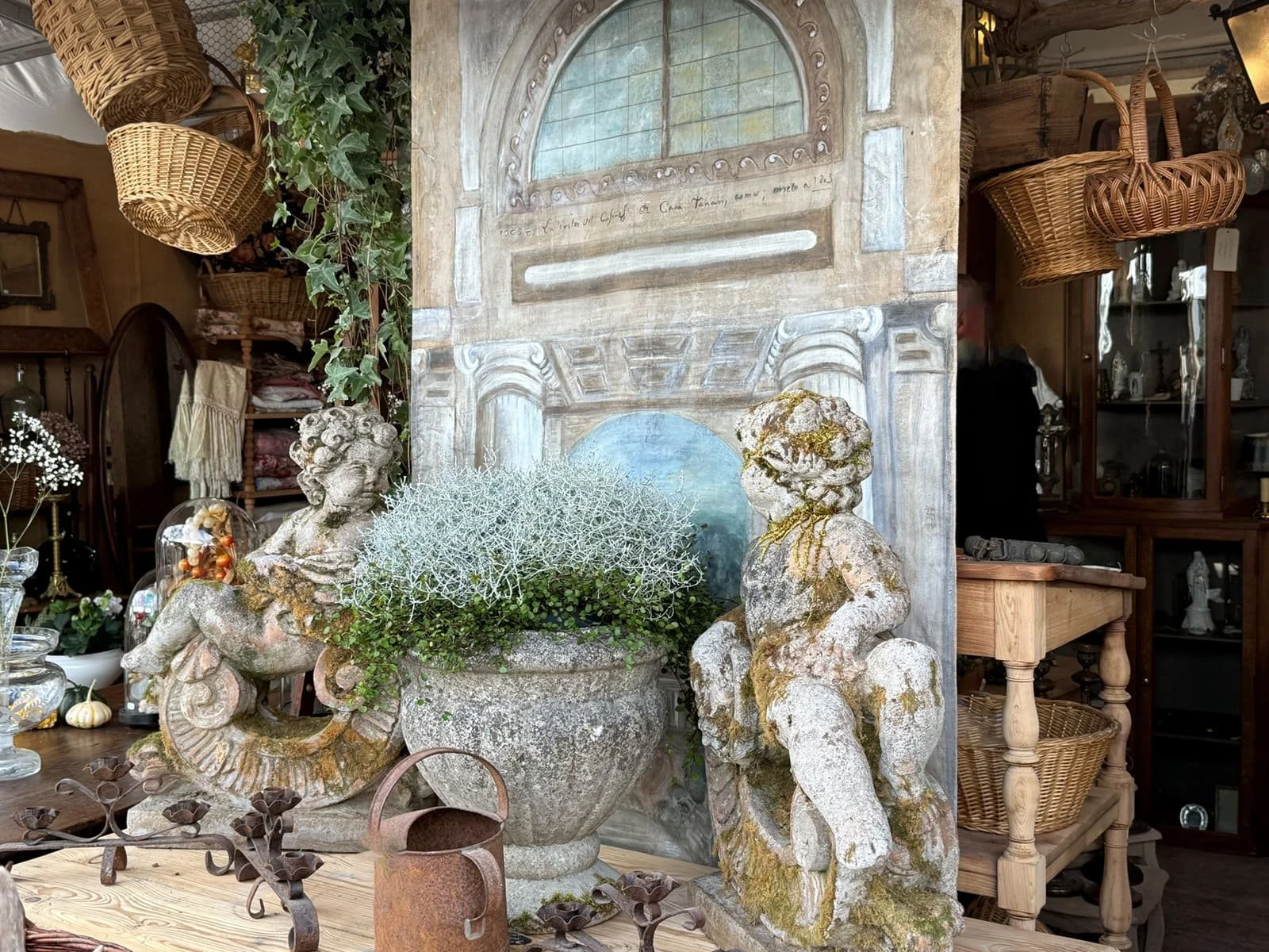 paris flea market antiques cherub statues stone planter urn hanging baskets