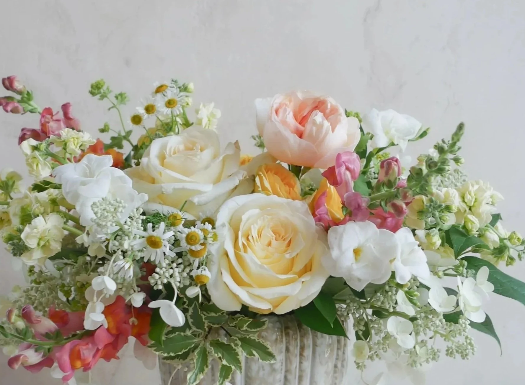 blush pink coral flower arrangement