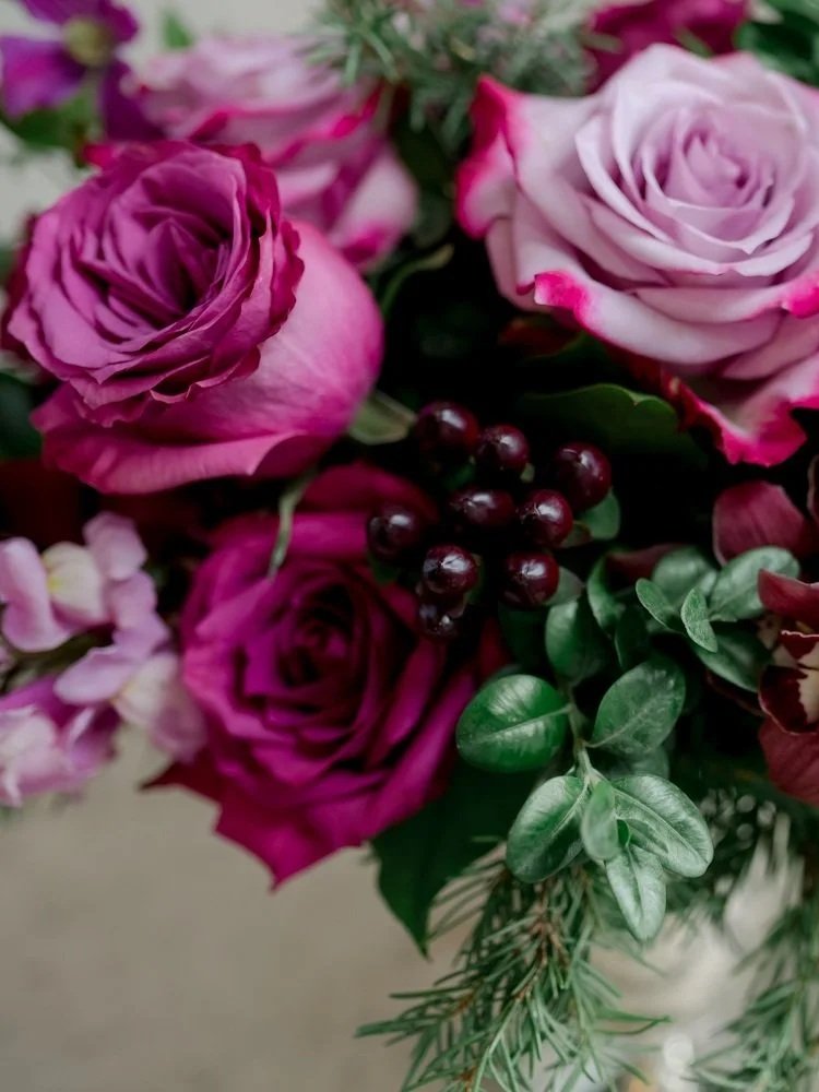 holiday-flower-arrangement-cymbidium-orchids-roses-le-bijoux-rubis-closeup.jpg
