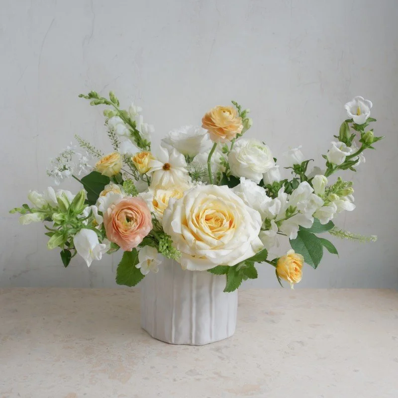 yellow white flower arrangement