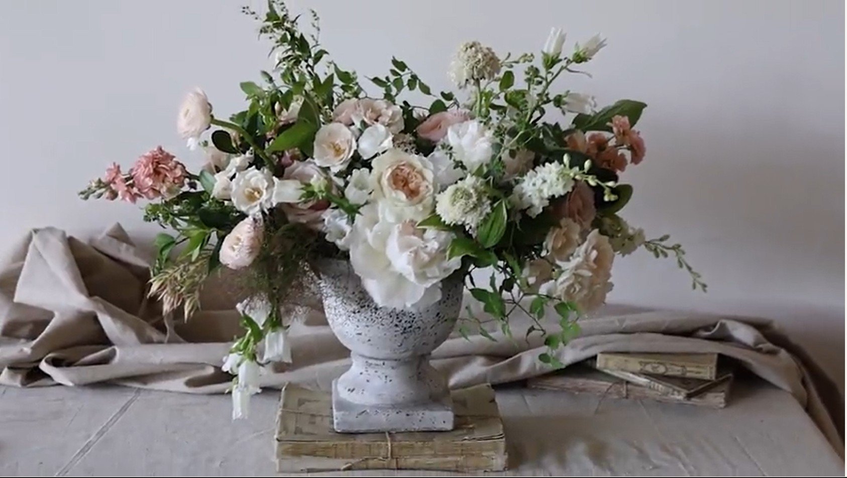 floral-arrangement-pink-roses-rustic-urn-sandra-sigman.jpg
