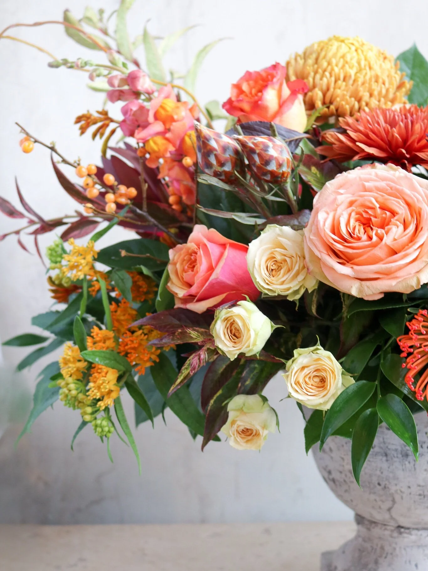 fall flowers autumn floral arrangement orange mums peach roses rustic urn table centerpiece les fleurs florist local delivery andover
