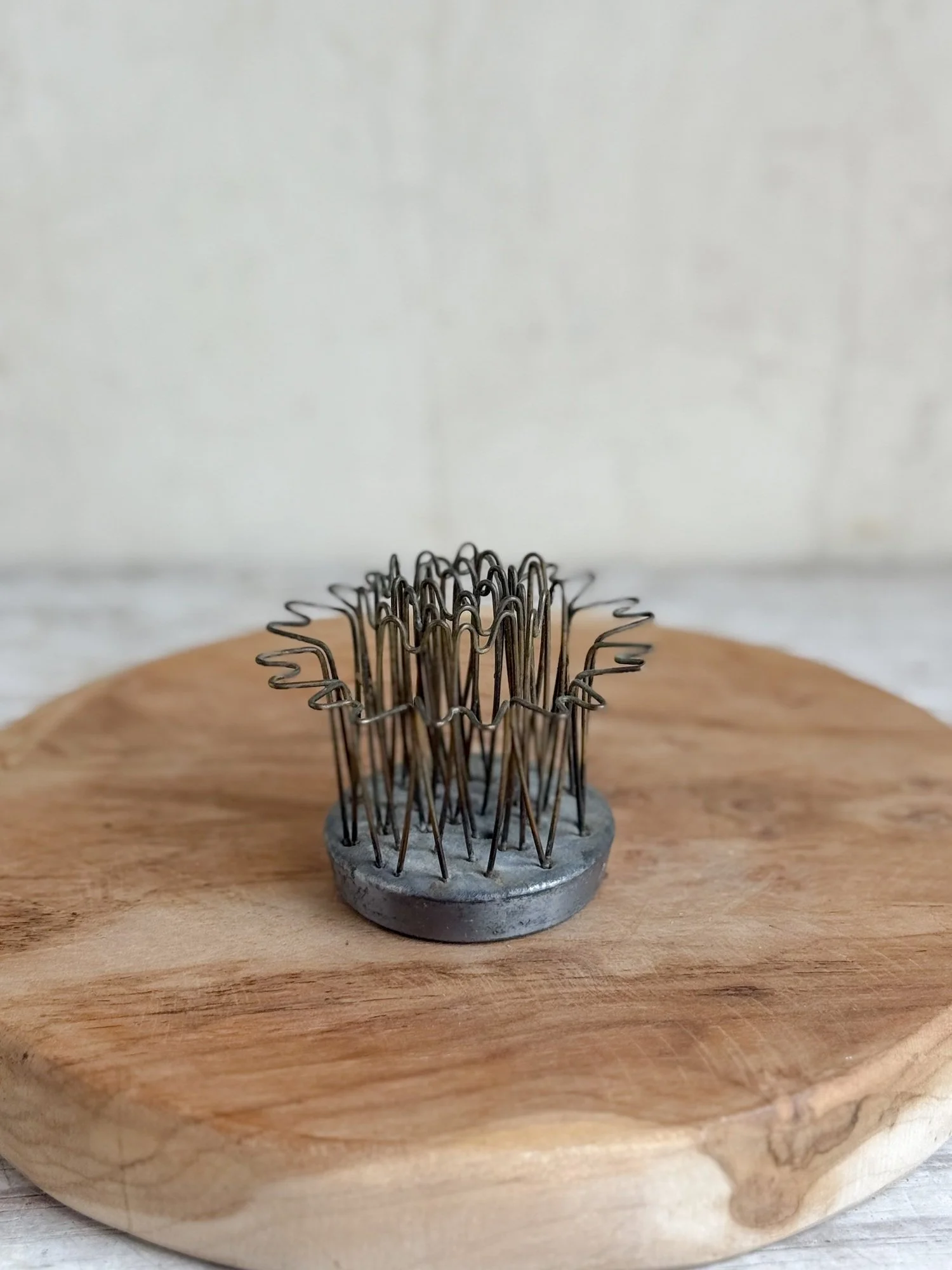 vintage-hairpin-flower-frog-tall-round-silver-bronze-floral-arranging-frogs.jpg