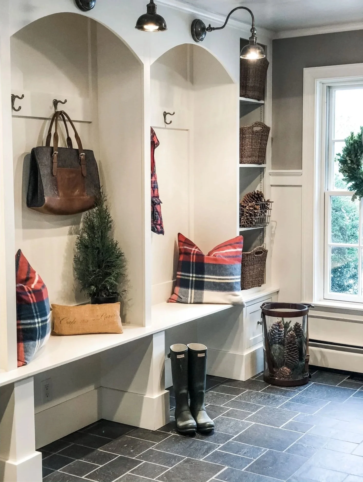 mudroom entryway plaid pillows rain boots
