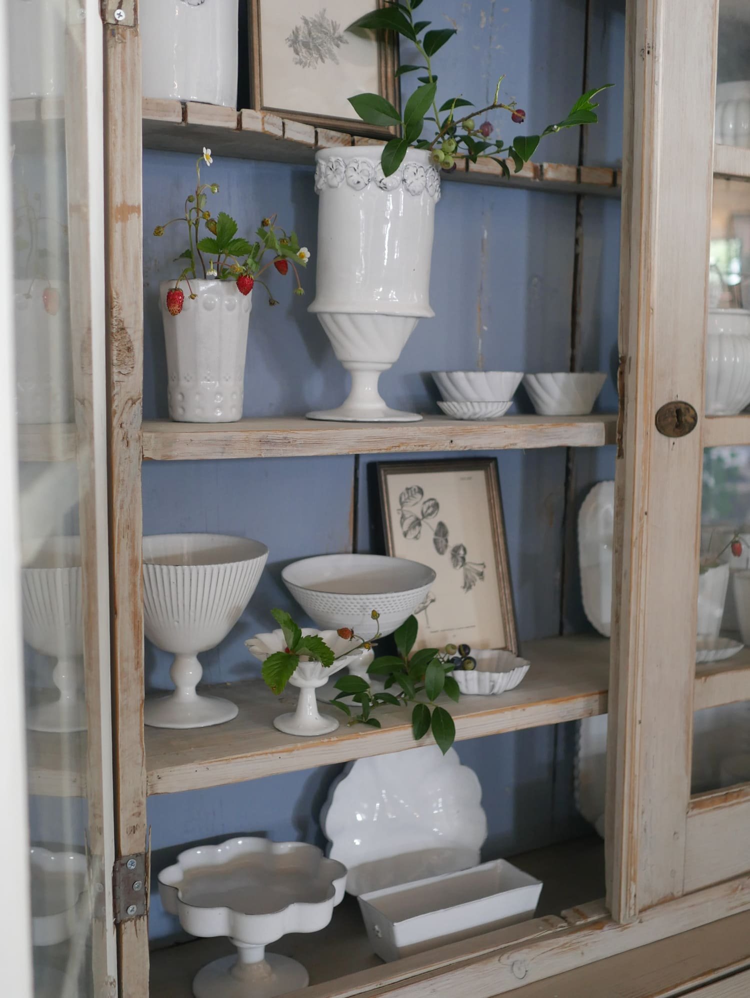 les fleurs andover french handmade pottery provene ceramic tableware in a cabinet