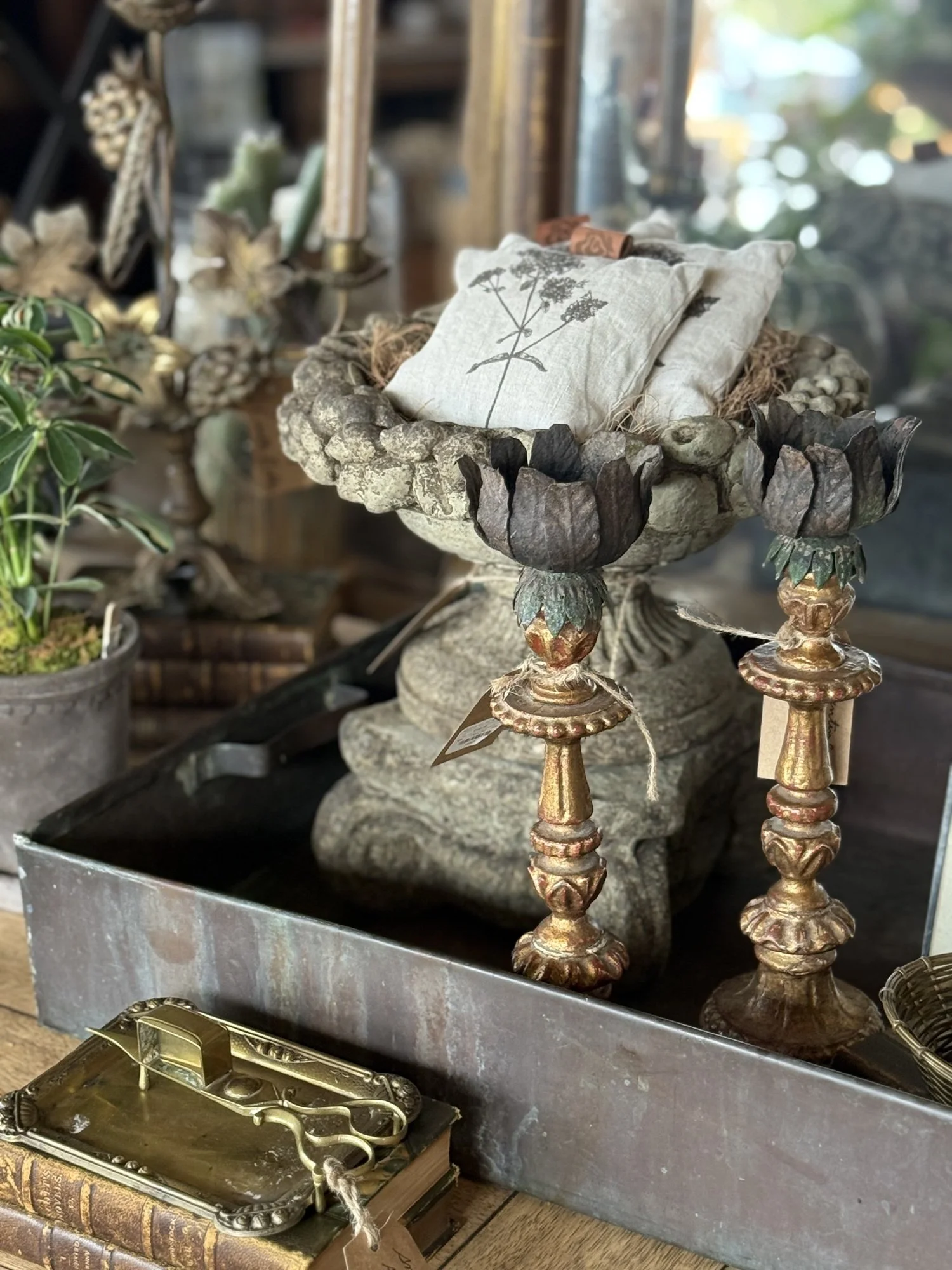 gilt wood candlesticks stone garden urn lavender sachet pillows brass candle snuffer