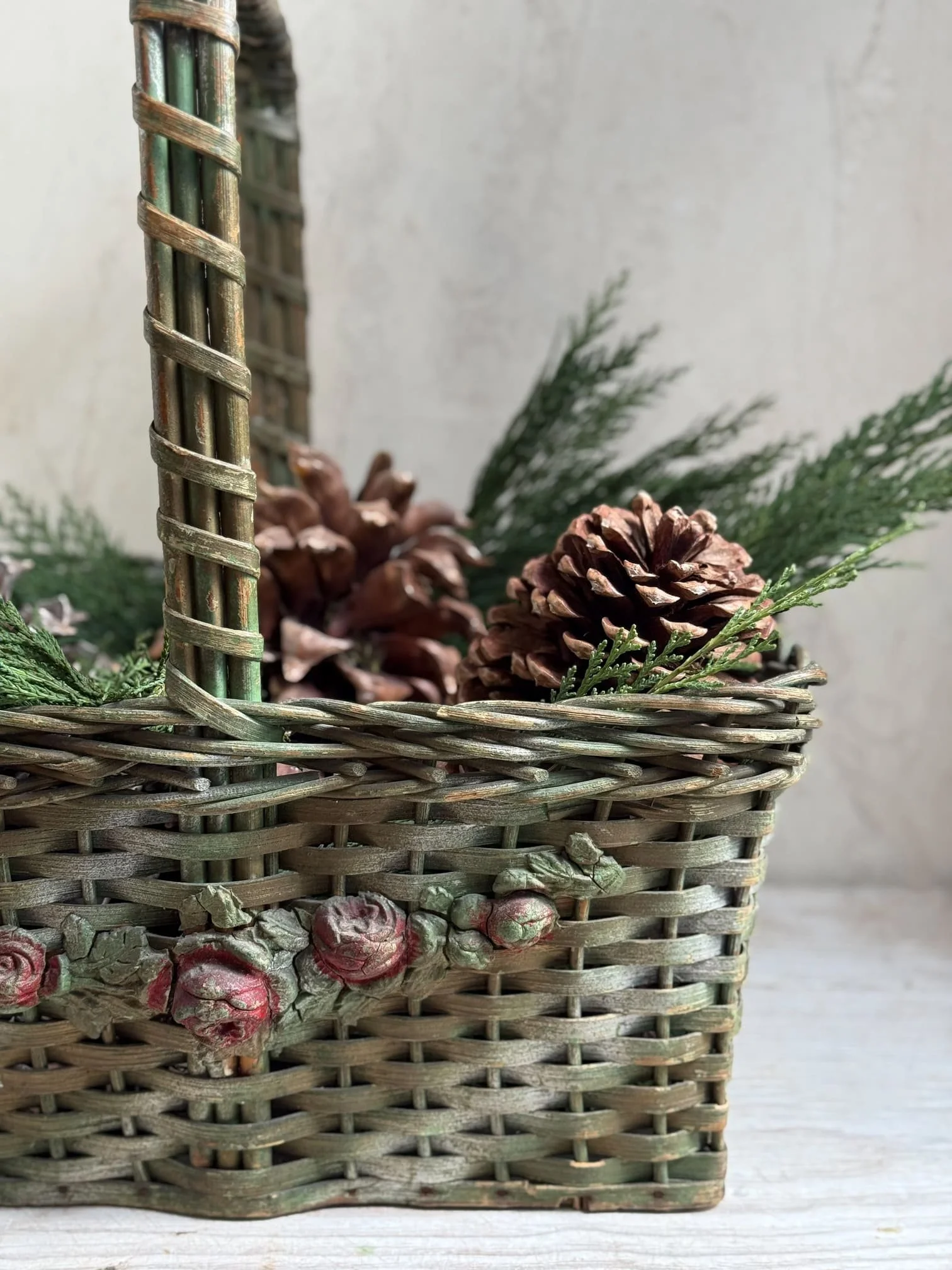 vintage-gathering-basket-pine-cones-winter-greenery.jpg