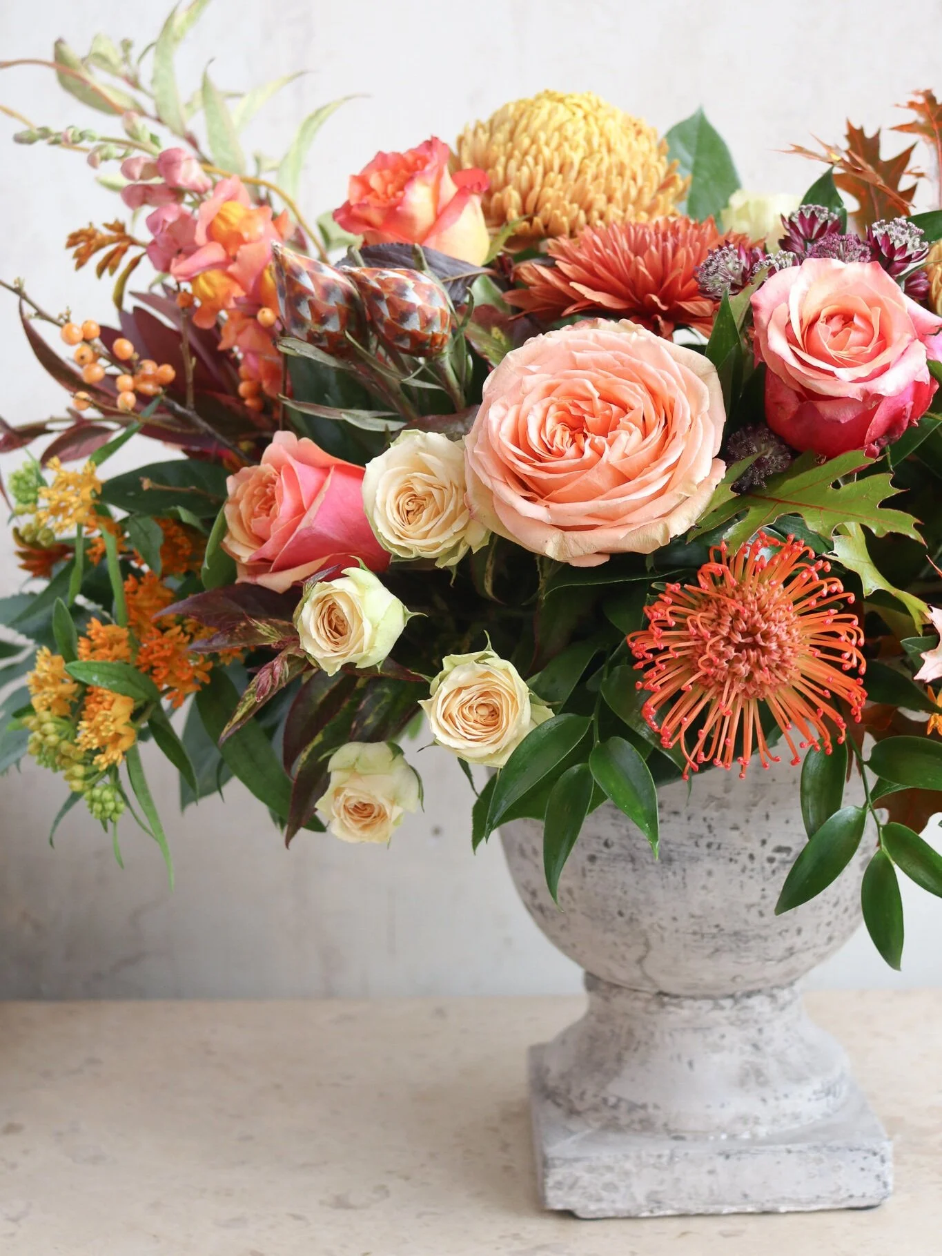 fall flowers autumn floral arrangement orange mums peach roses rustic urn table centerpiece les fleurs florist local delivery andover