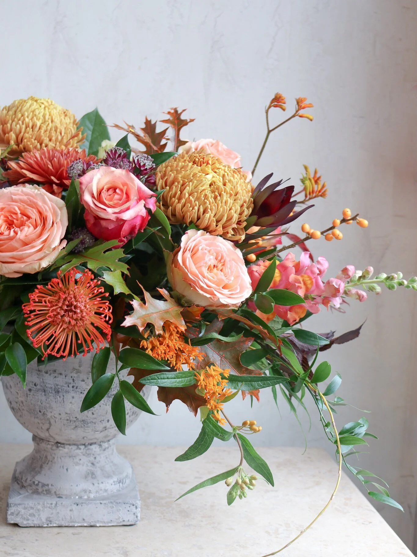 fall flowers autumn floral arrangement orange mums peach roses rustic urn table centerpiece les fleurs florist local delivery andover