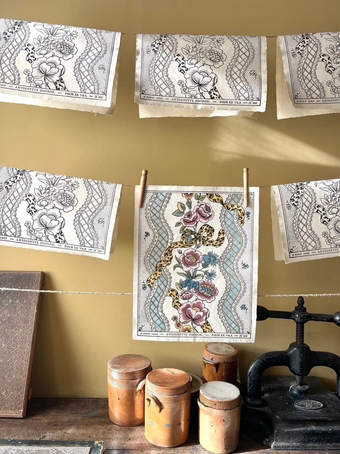 block printed paper hand colored domino paper drying antoinette poisson parisian artisan studio