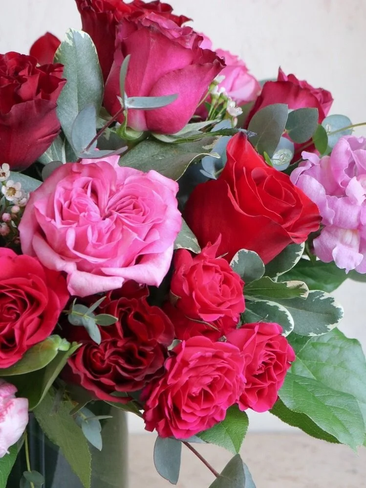 red and pink valentines day flower arrangement roses dutch tulips flower delivery by Les Fleurs Andover MA (Copy)