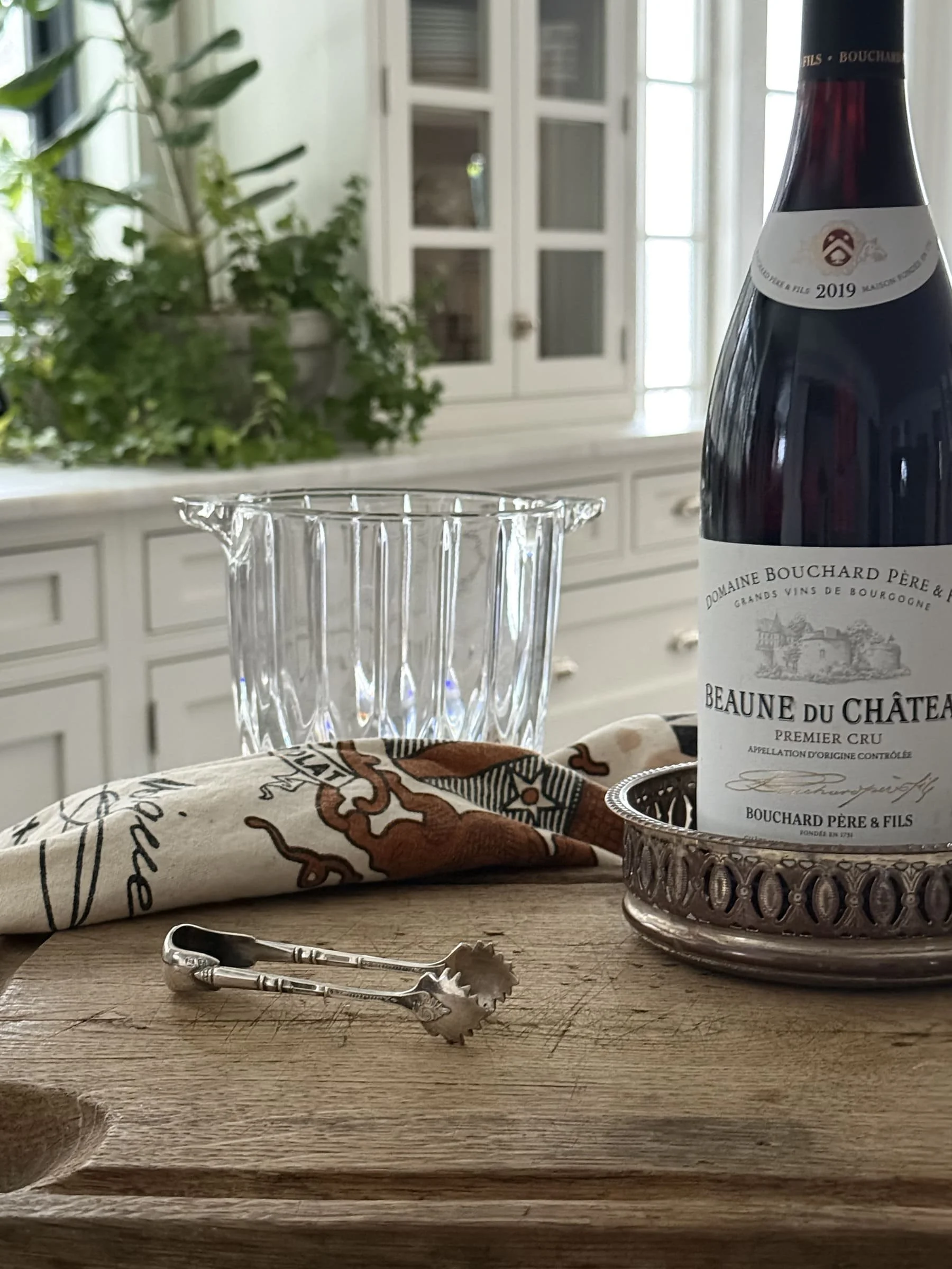 antique silver sugar tongs glass ice bucket silver wine bottle coaster