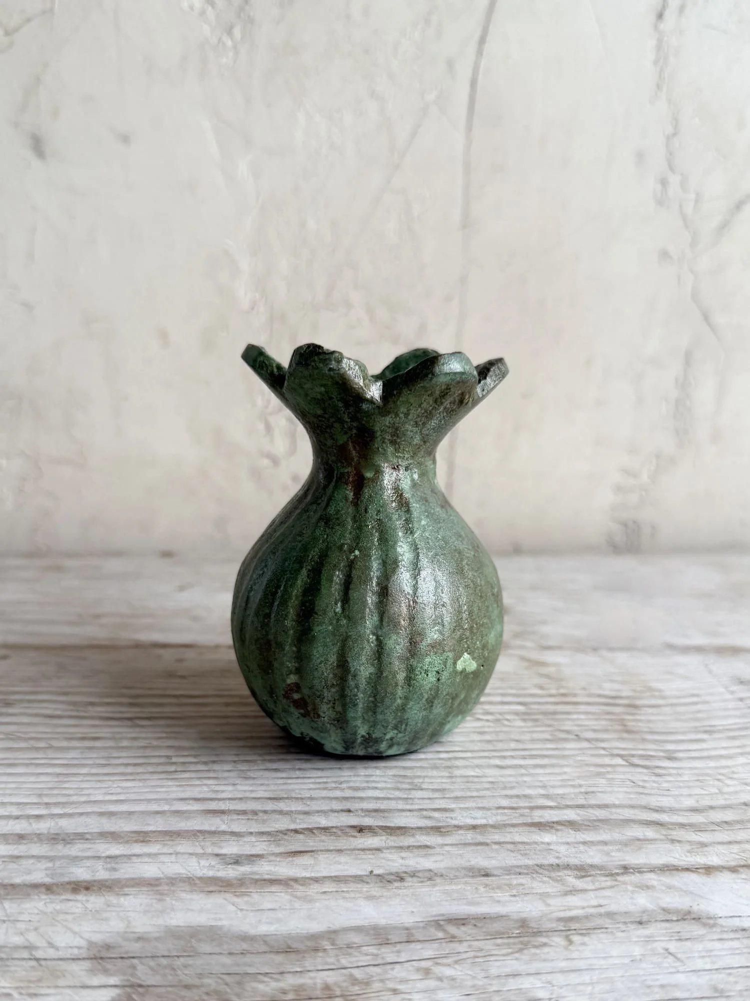 green-patina-metal-poppy-bud-vase (2).jpg