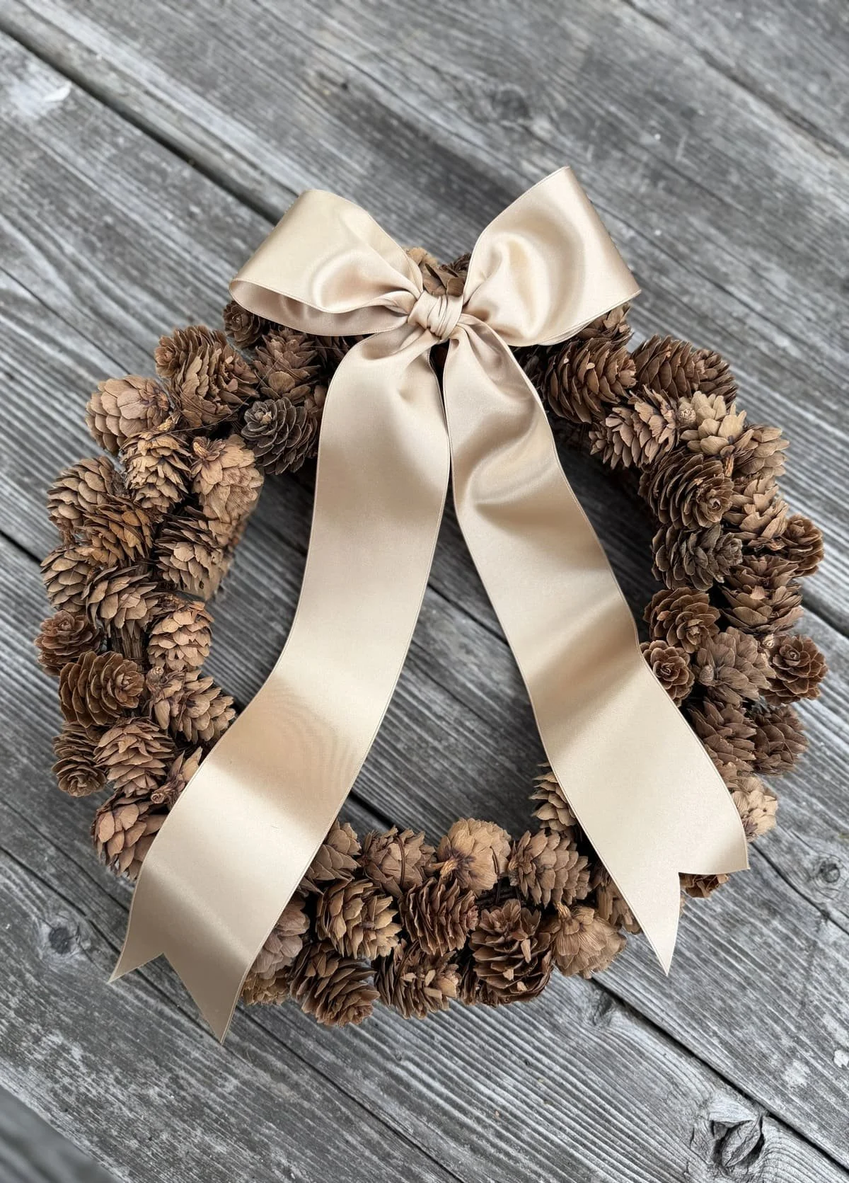 larix-pine-cone-holiday-wreath-satin-bow.jpg